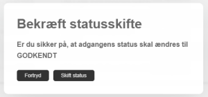 Billedet viser knappen Fortryd og knappen Skift status på siden Bekræft statusskifte.